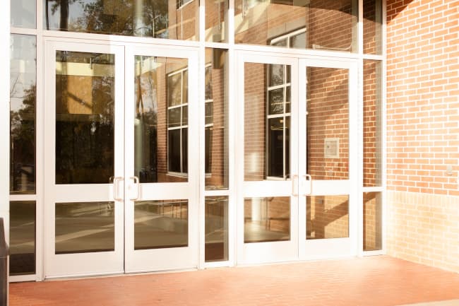 Impact storefront glass facade installation