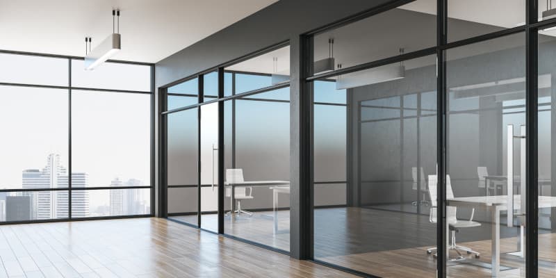 Commercial office partition in architectural glass